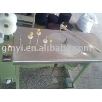 Automatic webbing rolling machine